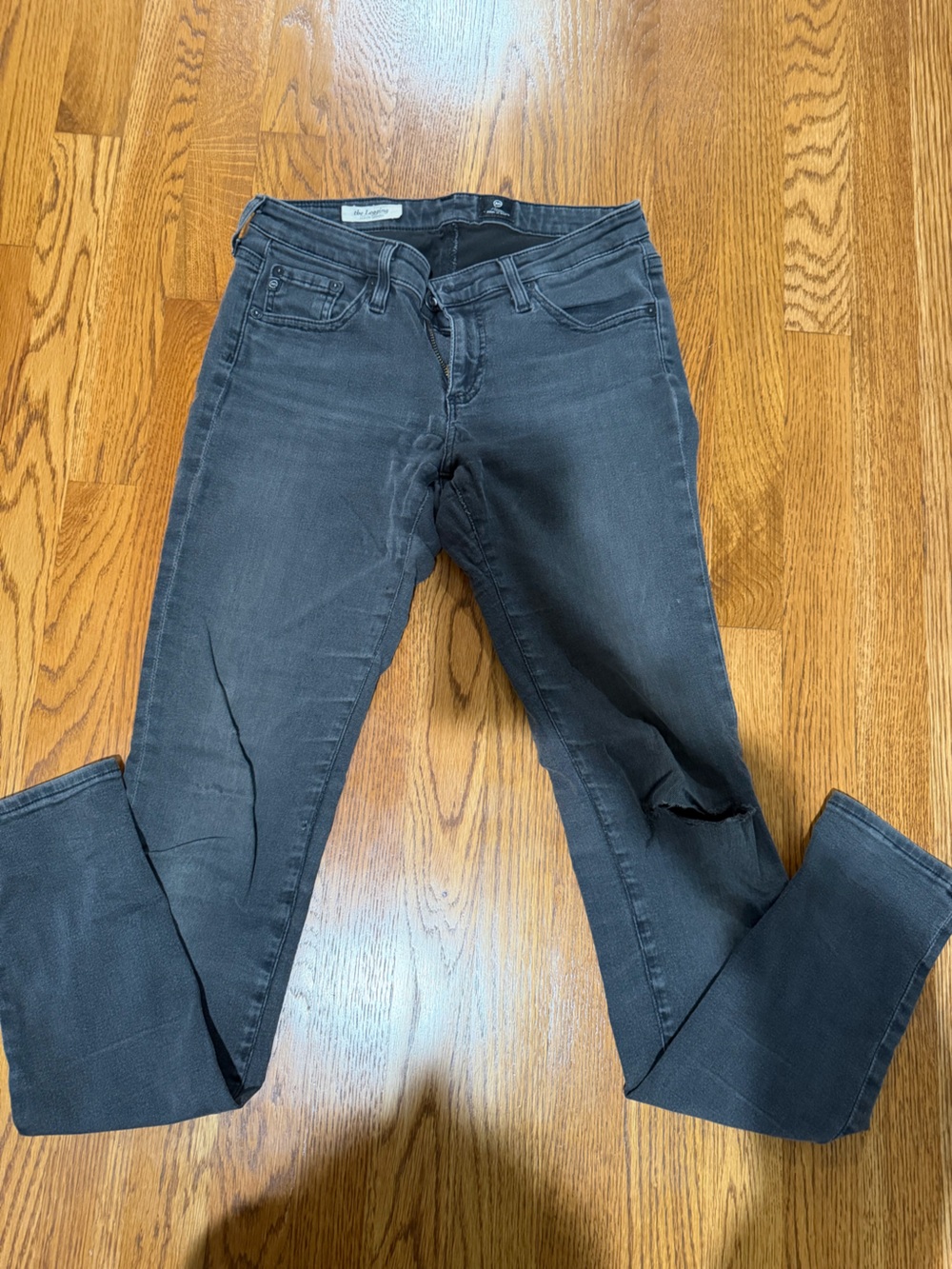 AG Distressed The legging Jean in dark gray